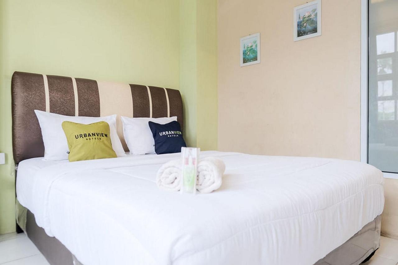 Urbanview Hotel Ta Ke Jelutung Puncak Jambi Extérieur photo