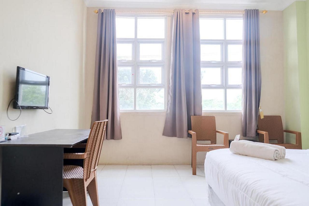 Urbanview Hotel Ta Ke Jelutung Puncak Jambi Extérieur photo